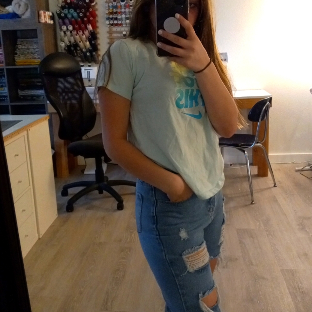 Light blue Nike tee large in kids